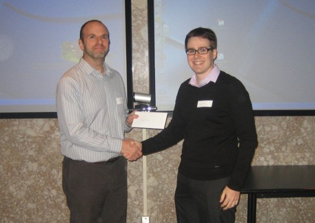  Davin Allen, FASC Ottawa, presents Fugro Scholarship to Michal Kolaj, PhD candidate.